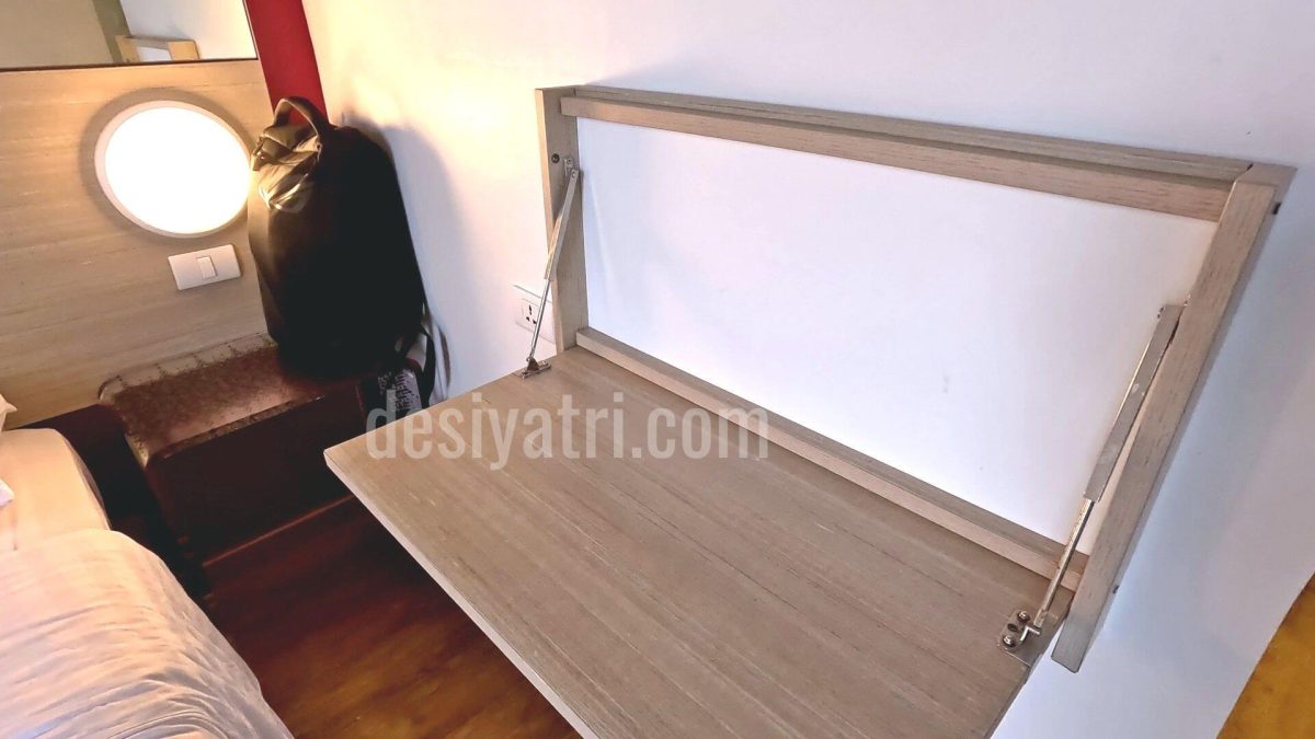 A Folding Table In Guest Room of Hotel Red Planet, Patong, Phuket